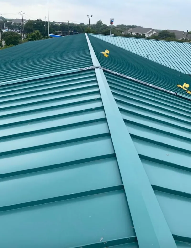 Green commercial metal roof ridge and valley for Metal Roof Repair in Beach Park